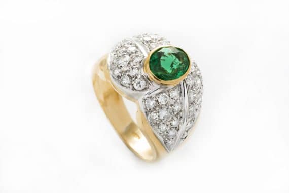 Platinum emerald and diamond ring